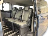 four seats in the back of a van with the door open