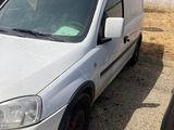 a white van that is parked in a parking lot