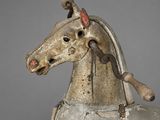 statue of a horse with a saddle on it ' s back