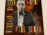 a picture of a book with a picture of a man in a suit and tie