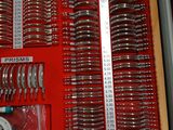 a red box with a bunch of silverware in it