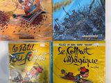 quatre livres pour enfants, dont les aventures de Tintin et les aventures de Tintin et les aventures