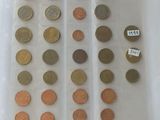 a lot of coins in a plastic bag on the table