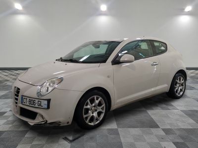 a picture of a white car parked in a garage