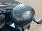 an image of a close up of a motorcycle ' s side view mirror