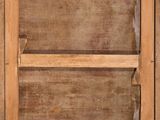 an old wooden window with a wooden frame on it