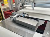an image of a factory with a conveyor belt and a conveyor belt