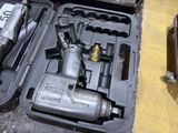 a tool in a case that is sitting on the floor