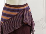 a picture of a woman ' s skirt with a purple and orange stripe