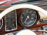 dashboard of a classic car with a speedometer, gauges, and steering wheel