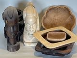 many different pieces of art that are on the table