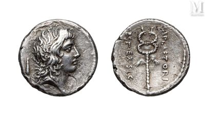 a silver coin with an image of a woman on it