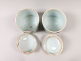three blue and white bowls sitting next to each other on a white surface
