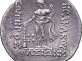 a close up of a silver coin with a woman on it