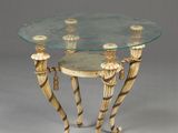 a table with a glass top that has candles on it