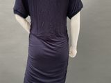 an image of a mannequin mannequin wearing a purple dress