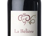 a bottle of wine that is sitting on a table
