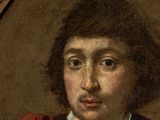 portrait of a young man in a red cloak