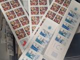 a bunch of stamps sitting on top of each other