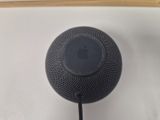 an apple homepod speaker is shown on a white surface