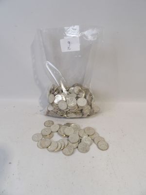 a bag full of coins sitting on a table