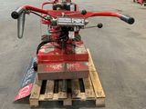 an image of a small machine that is on a pallet