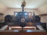 a clock that is sitting on a table in a room