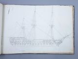 un livre ouvert sur lequel est dessiné un bateau
