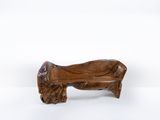 wooden bench made from a tree trunk on a white background