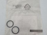 a pair of scissors in a plastic bag on a table
