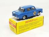 a blue toy car sitting on top of a box