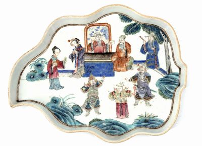 a plate with a picture of a group of people on it