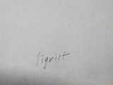 a piece of paper with writing on it sitting on a table