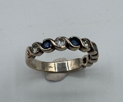 a close up of a ring on a white surface
