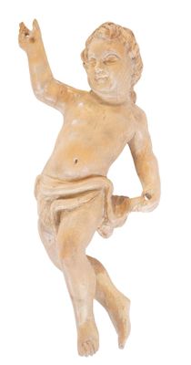 an image of a small statue of a boy holding a tennis racquet