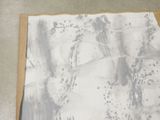 a picture of a piece of paper on the floor