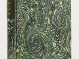 un livre vert et blanc orné d'un motif en spirale