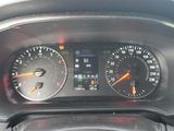 a close up of a car dashboard with various gauges