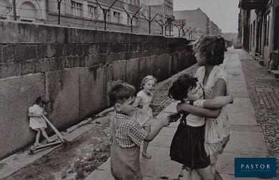 they are playing with each other on the side of the street