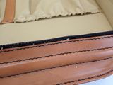 a close up of a piece of luggage on a table