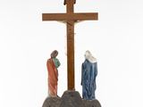 a figurine of jesus and mary on a cross