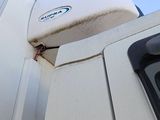 an image of a boat with a satellite antenna attached to it ' s side