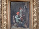 un tableau représentant un homme assis sur une chaise dans une pièce