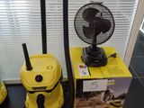 two vacuums that are sitting on the floor next to each other
