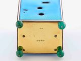 an image of a gold and blue box with a hole in the middle