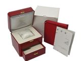 three red boxes with a ring inside of them on a white surface