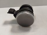 a black and white photo of a metal object on a table