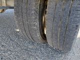 a close up of a tire on a truck