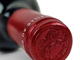 a bottle of wine that is sitting on a table
