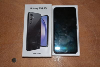 an image of a box with a phone inside of it on a table